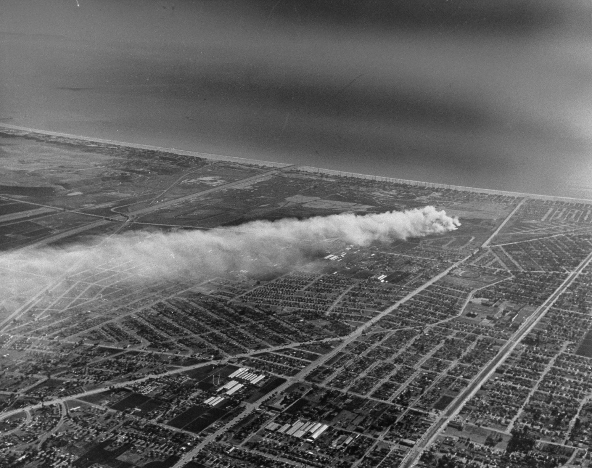 Smog settling over LA from trash dump.
