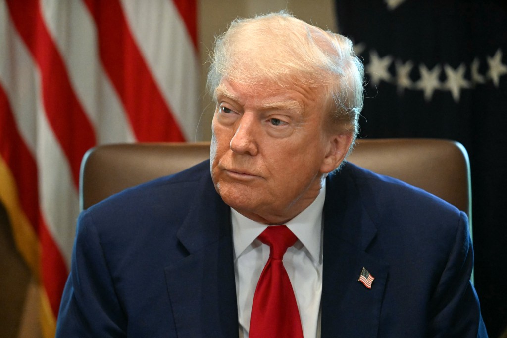 President Donald Trump looks on during a cabinet meeting in the Cabinet Room of the White House in Washington, DC, on April 30, 2025. 