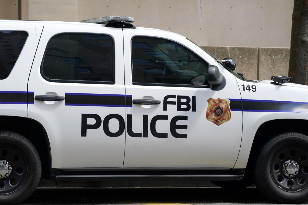A vehicle outside the J. Edgar Hoover FBI Building or FBI Headquarters in Washington D.C.