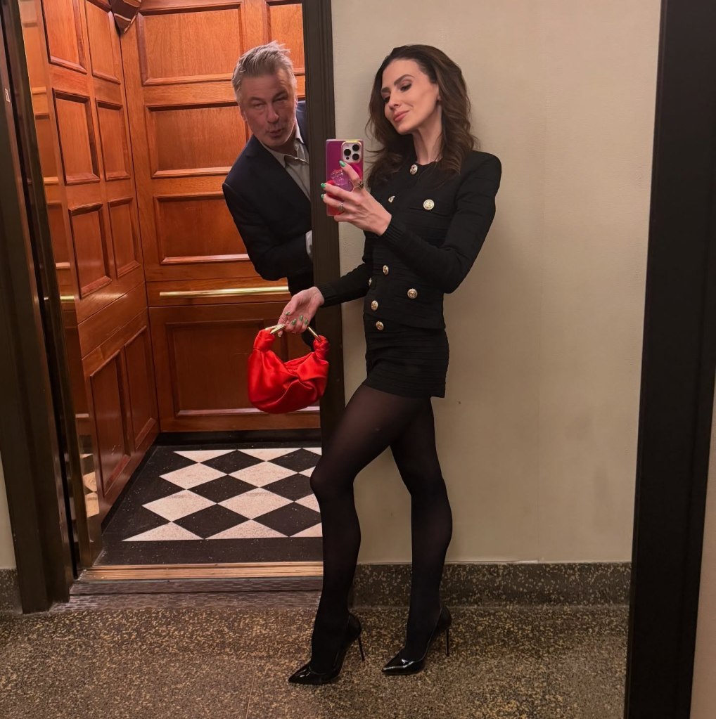 Alec and Hilaria Baldwin pose together.