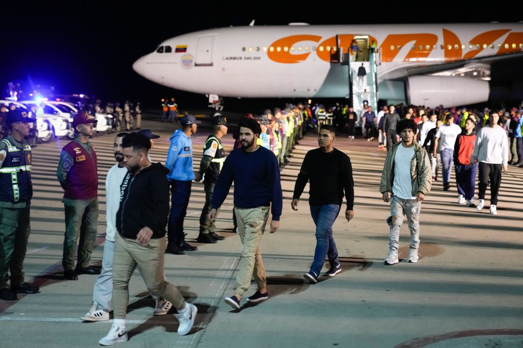 Venezuelan migrants arriving at Simon Bolivar International Airport in Maiquetia, Venezuela, after being deported from the United States on March 24, 2025