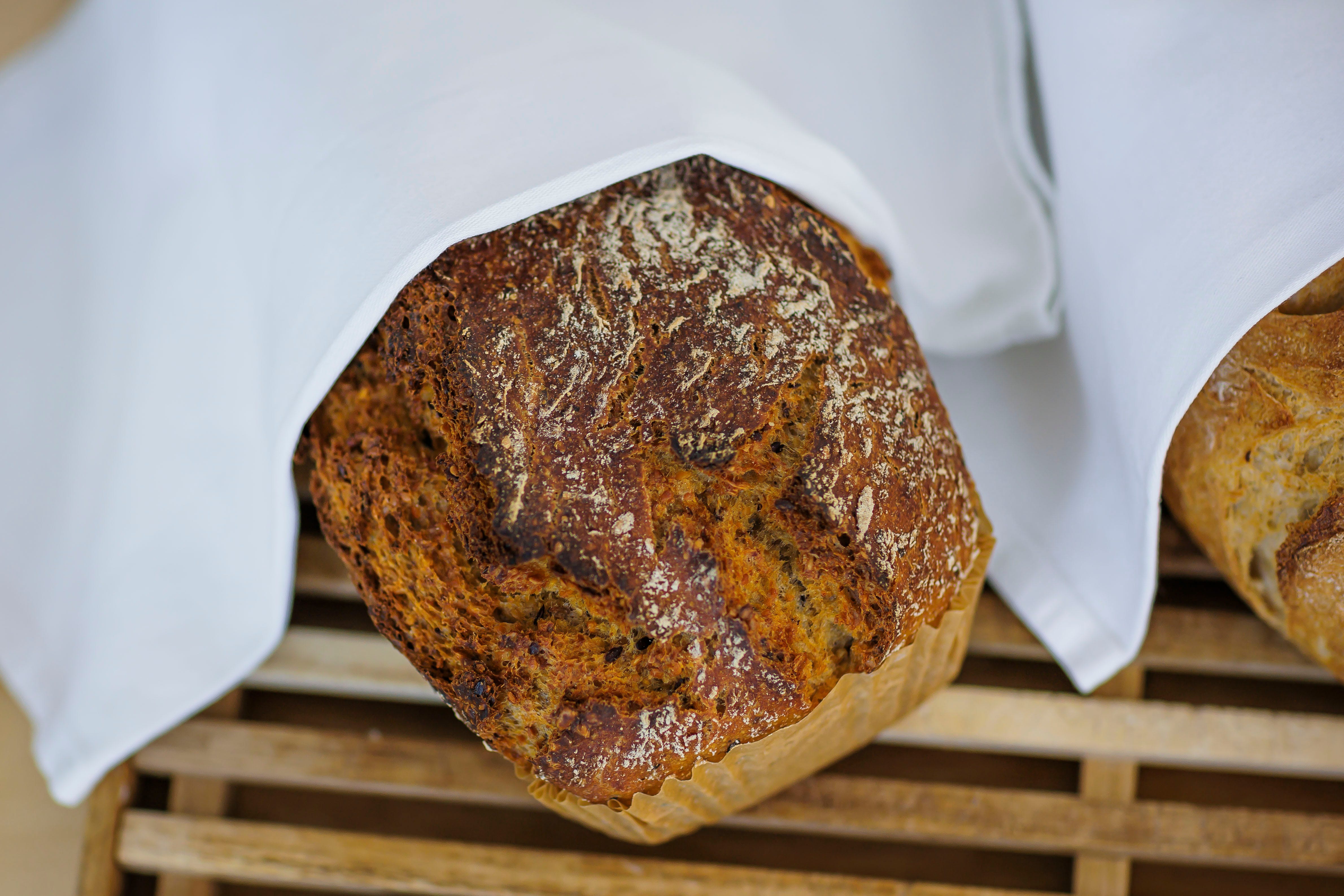 Bread under napkin at a bakery