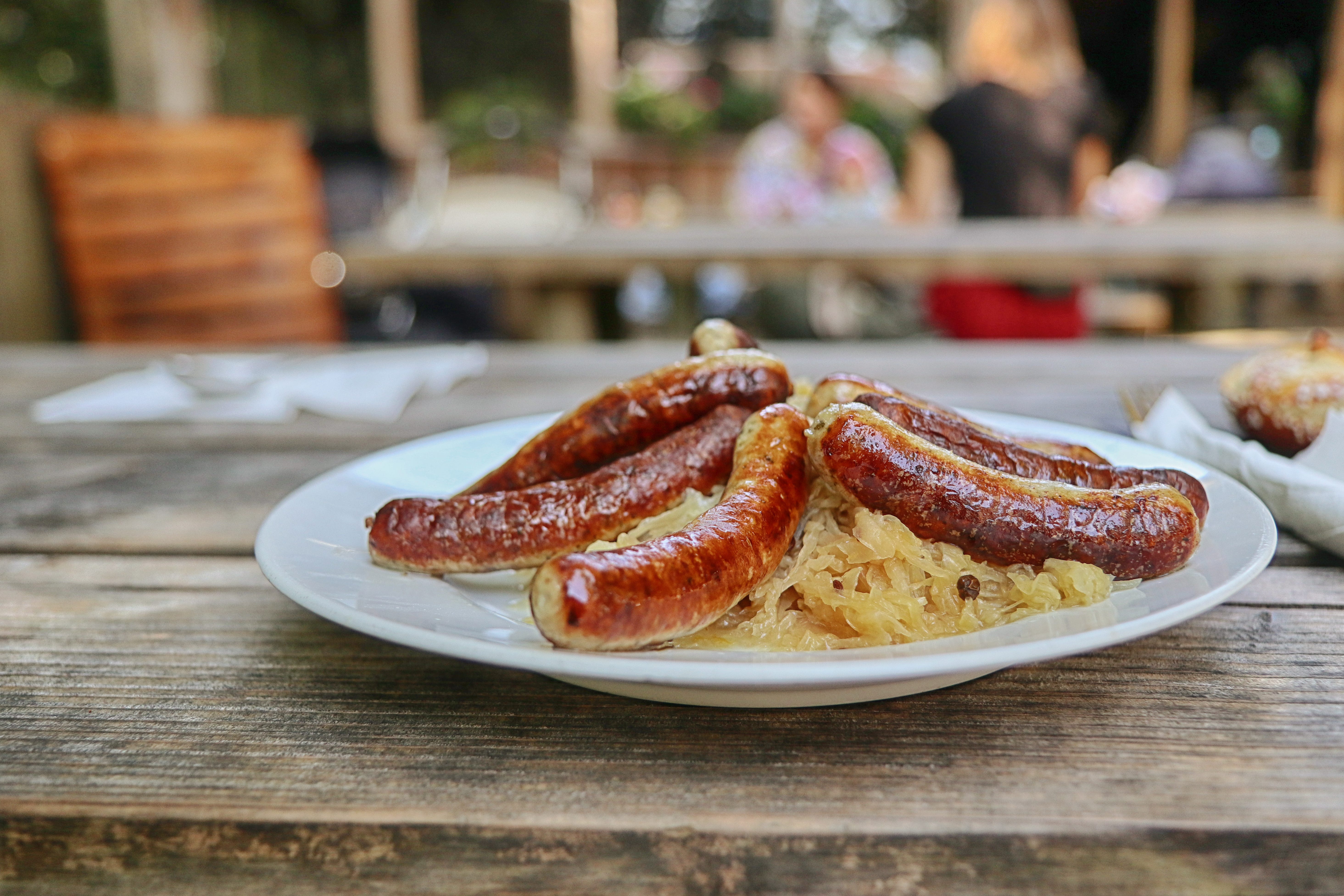 grilled bratwurst and sauerkraut on plate
