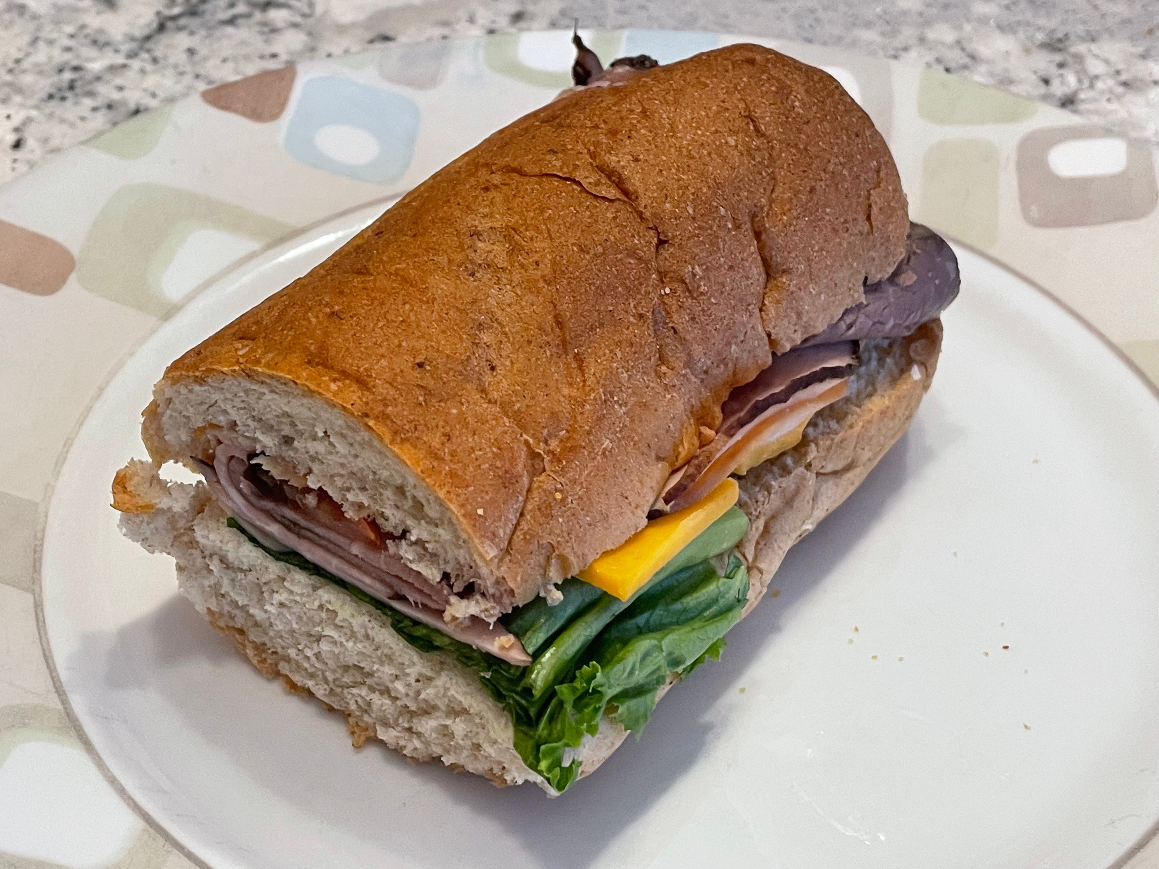 A close-up of the author's 3 meat stack sub from QuikTrip.