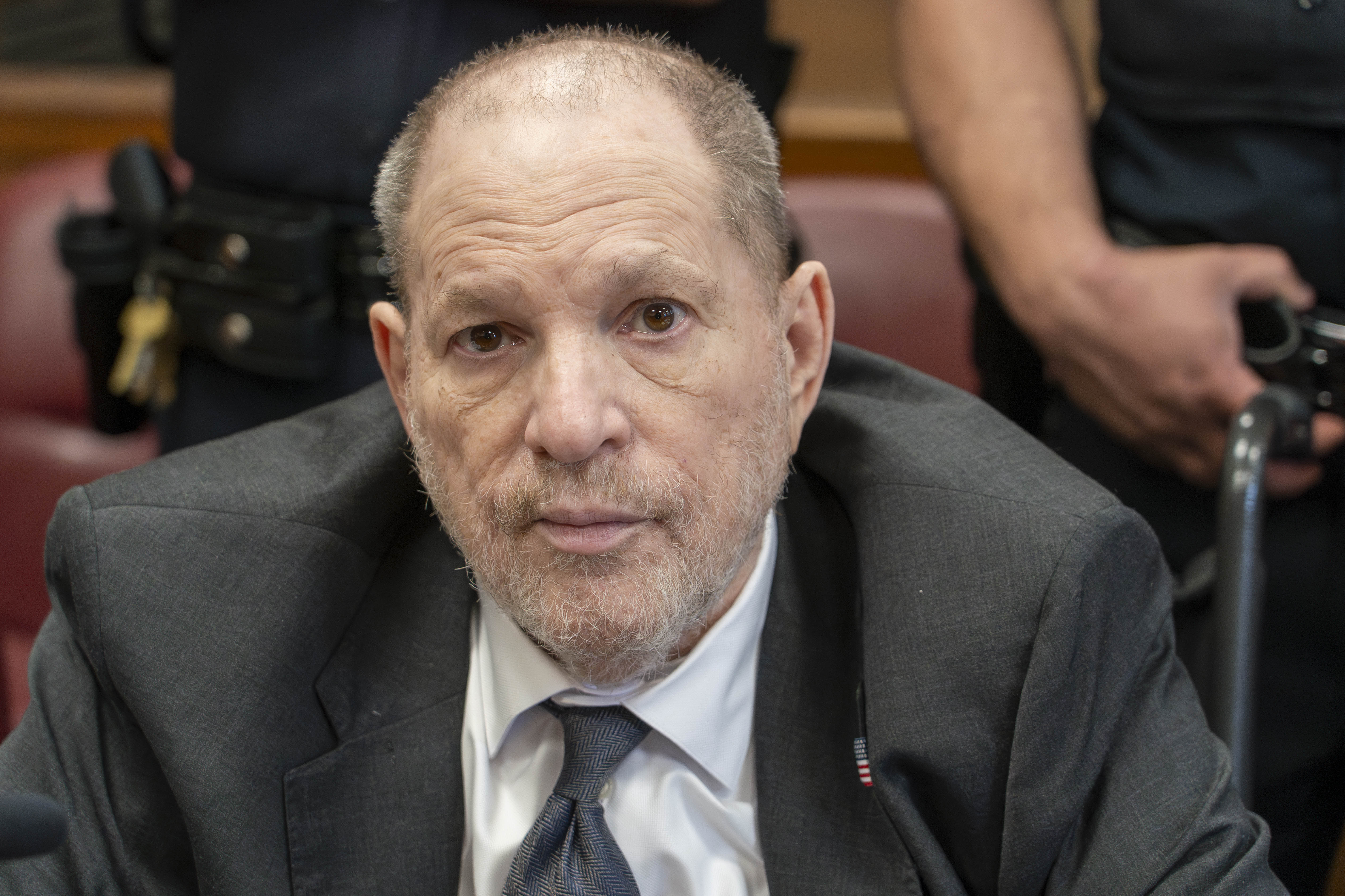 Harvey Weinstein listens during court. 