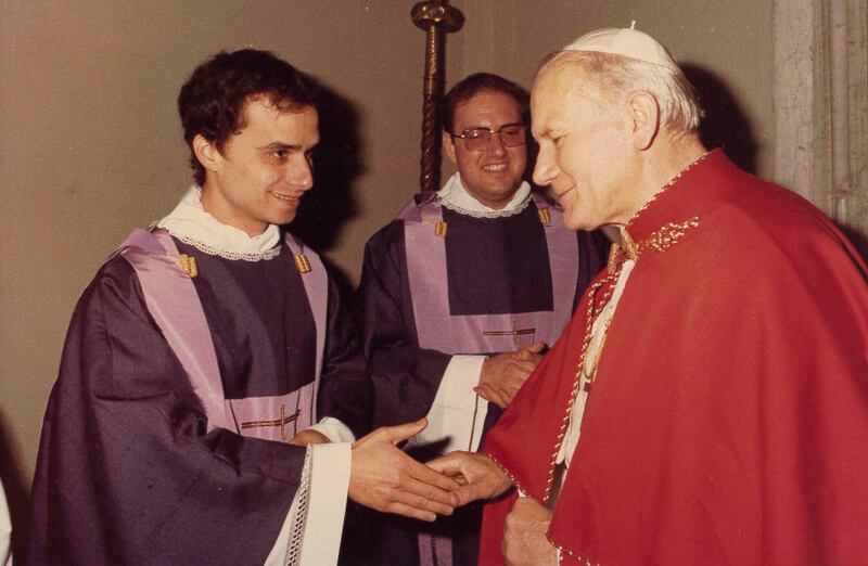 Newly-ordained Rev. Robert Francis Prevost, now Pope Leo XIV, meets Pope John Paul II in 1982.