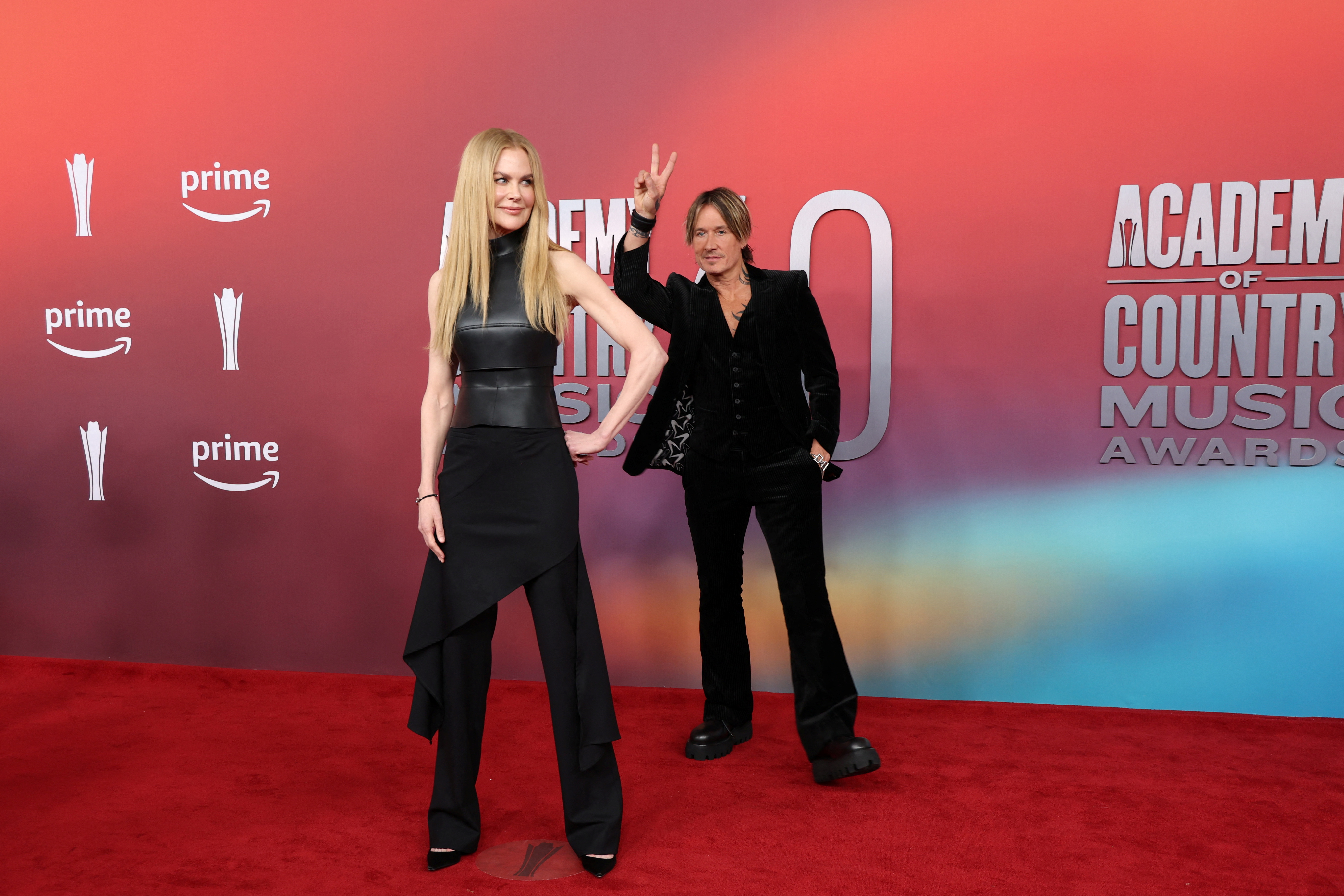Keith Urban and Nicole Kidman goof off at the ACMs. 