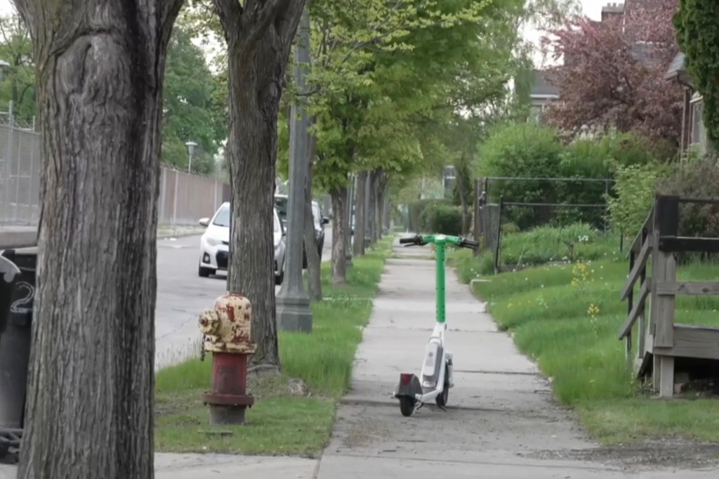 A scooter sits outside the home where a father is accused of forcing his daughter to break into, and then abandoning her when he was caught.