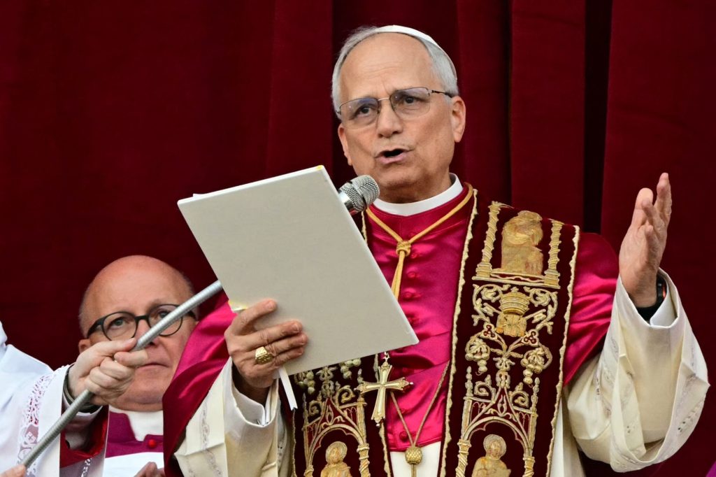 Newly elected Pope Leo XIV, Robert Prevost, addressing the crowd for the first time from the balcony of St Peter's Basilica in The Vatican, on May 8, 2025.