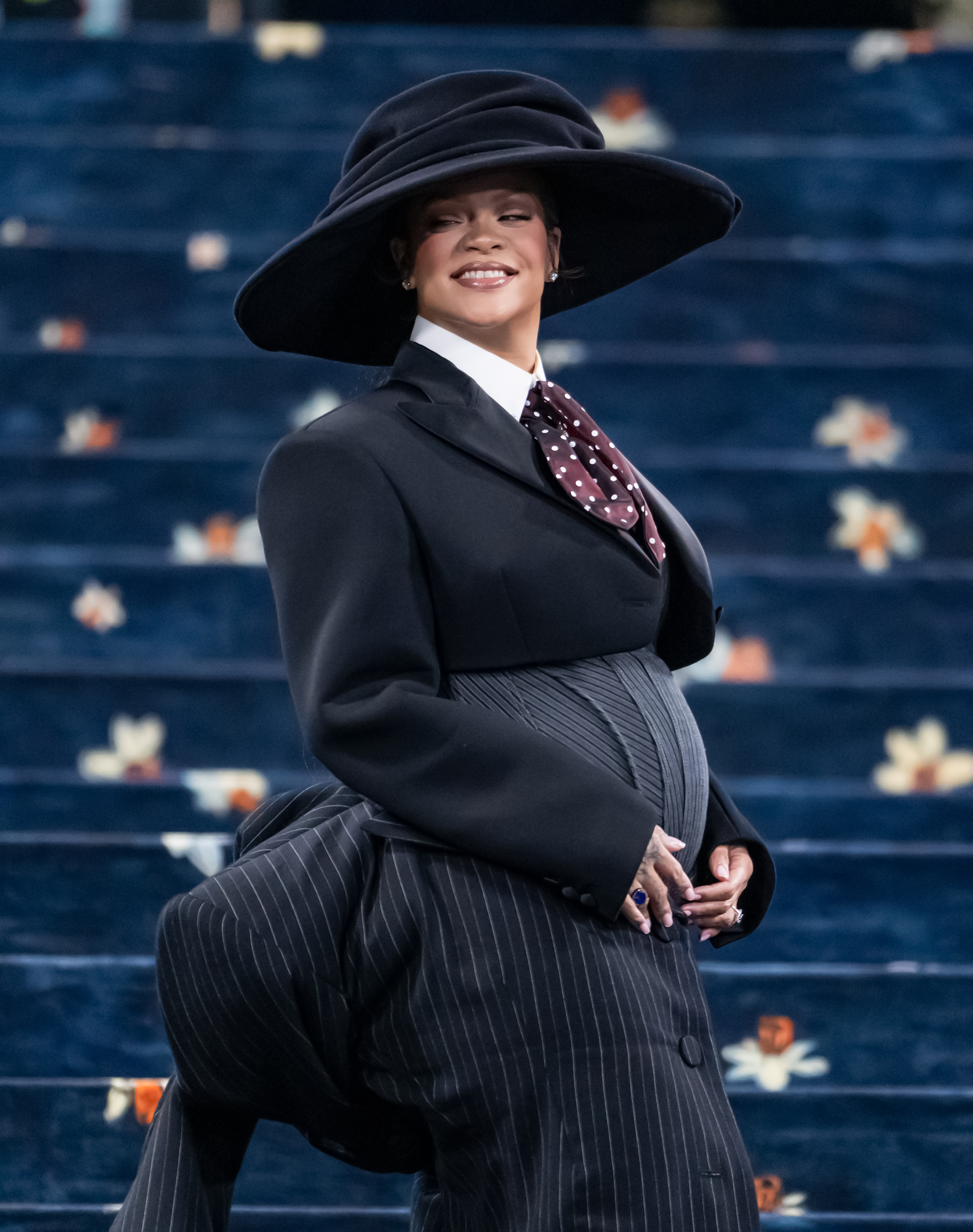 Rihanna shows off her baby bump at The 2025 Met Gala.