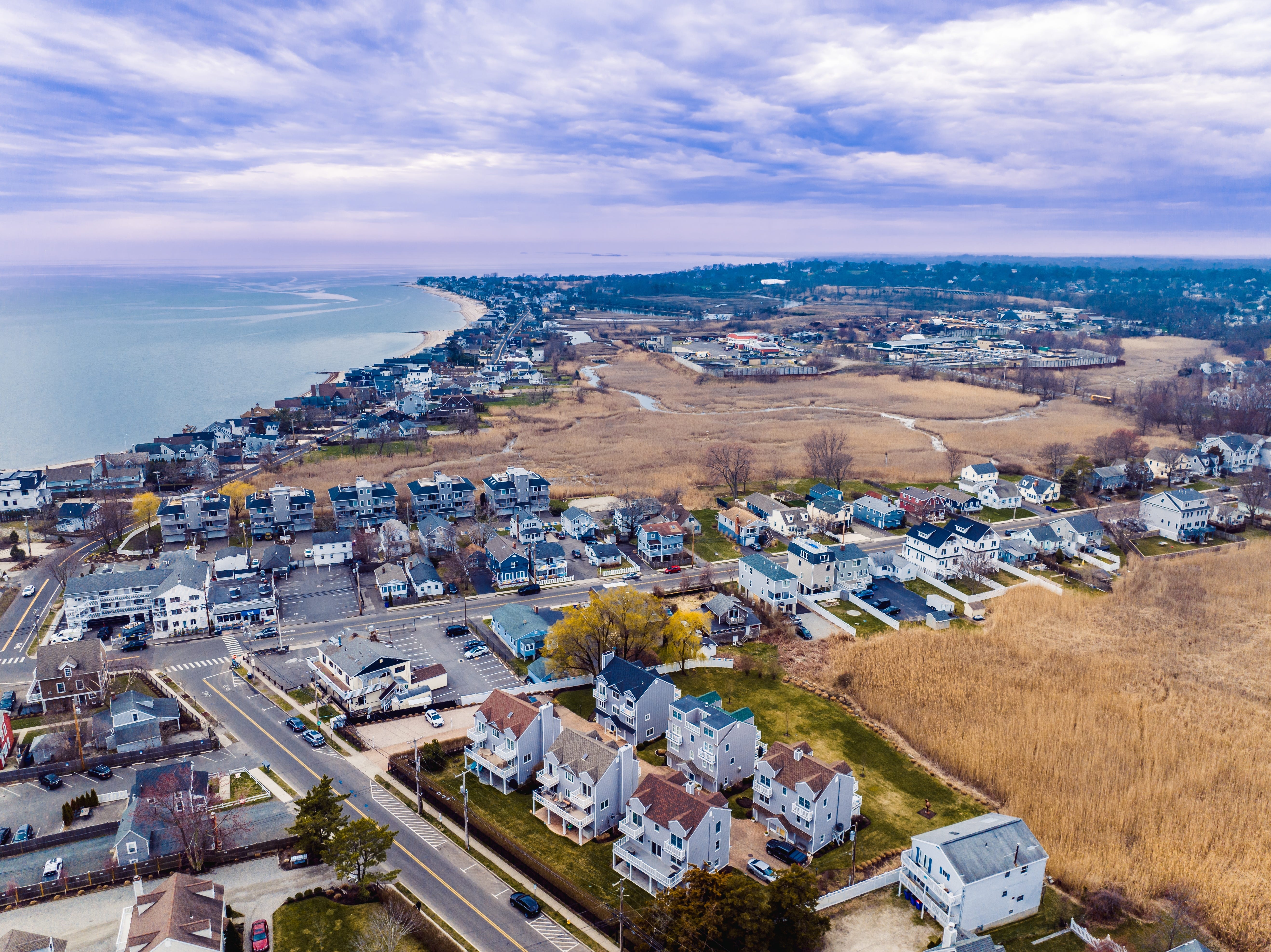 Aerial view of houses, beach in Fairfield, CT