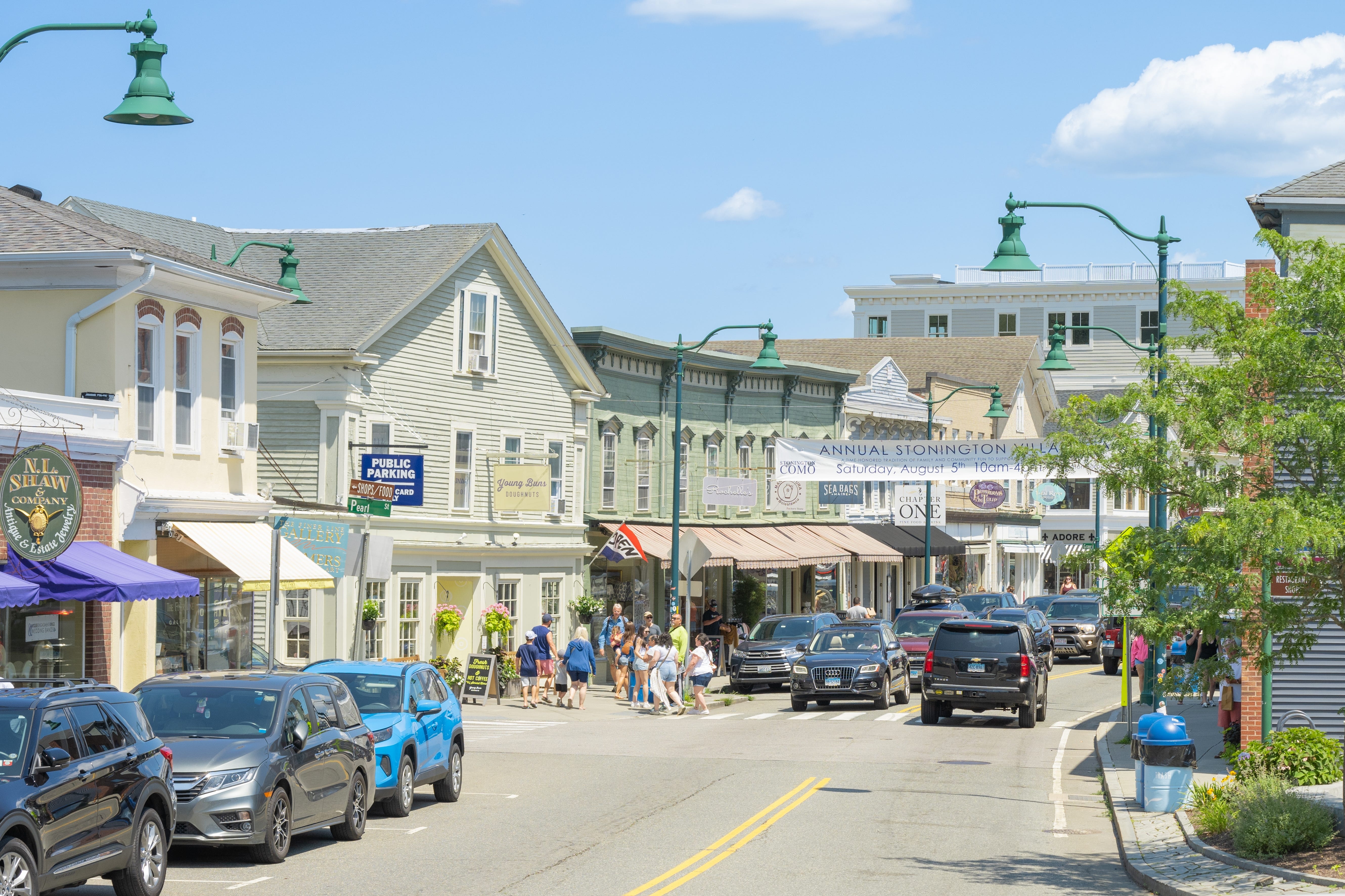 Town with colorful buildings on Main street in Mystic, Connecticut