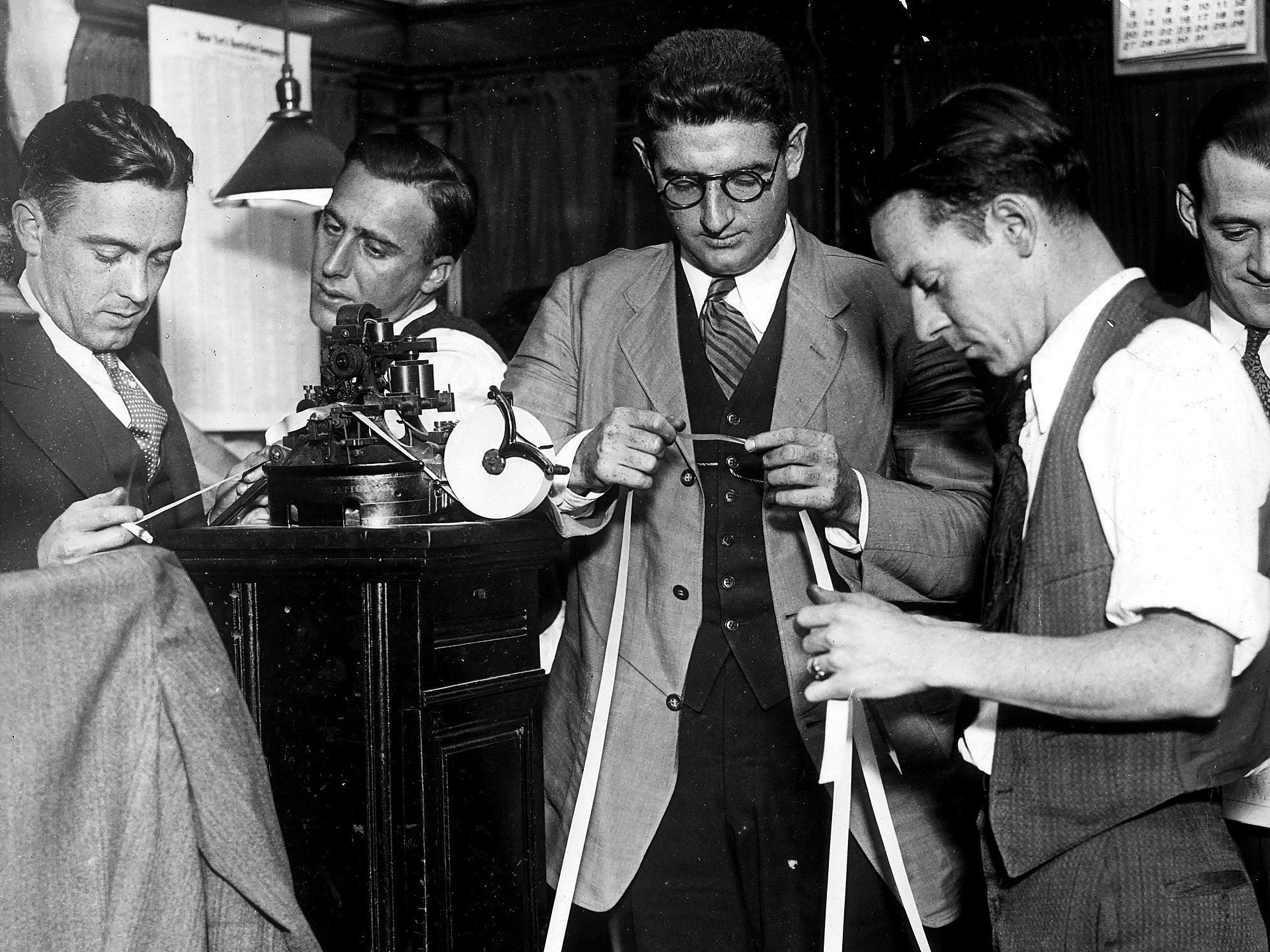 Stock brokers filling order after stock market crash 1929