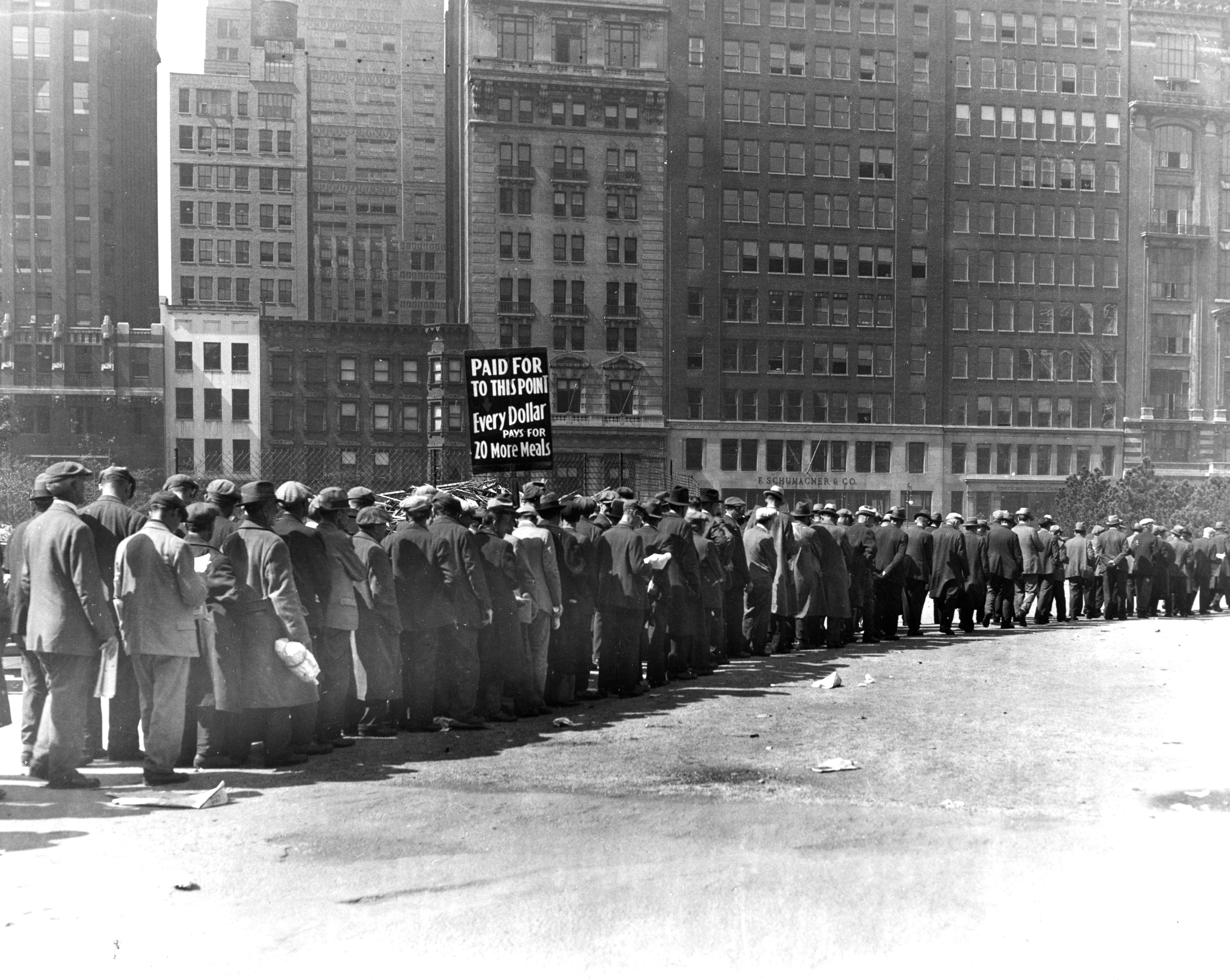 Line of unemployed men waiting for rations during the Great Depression.