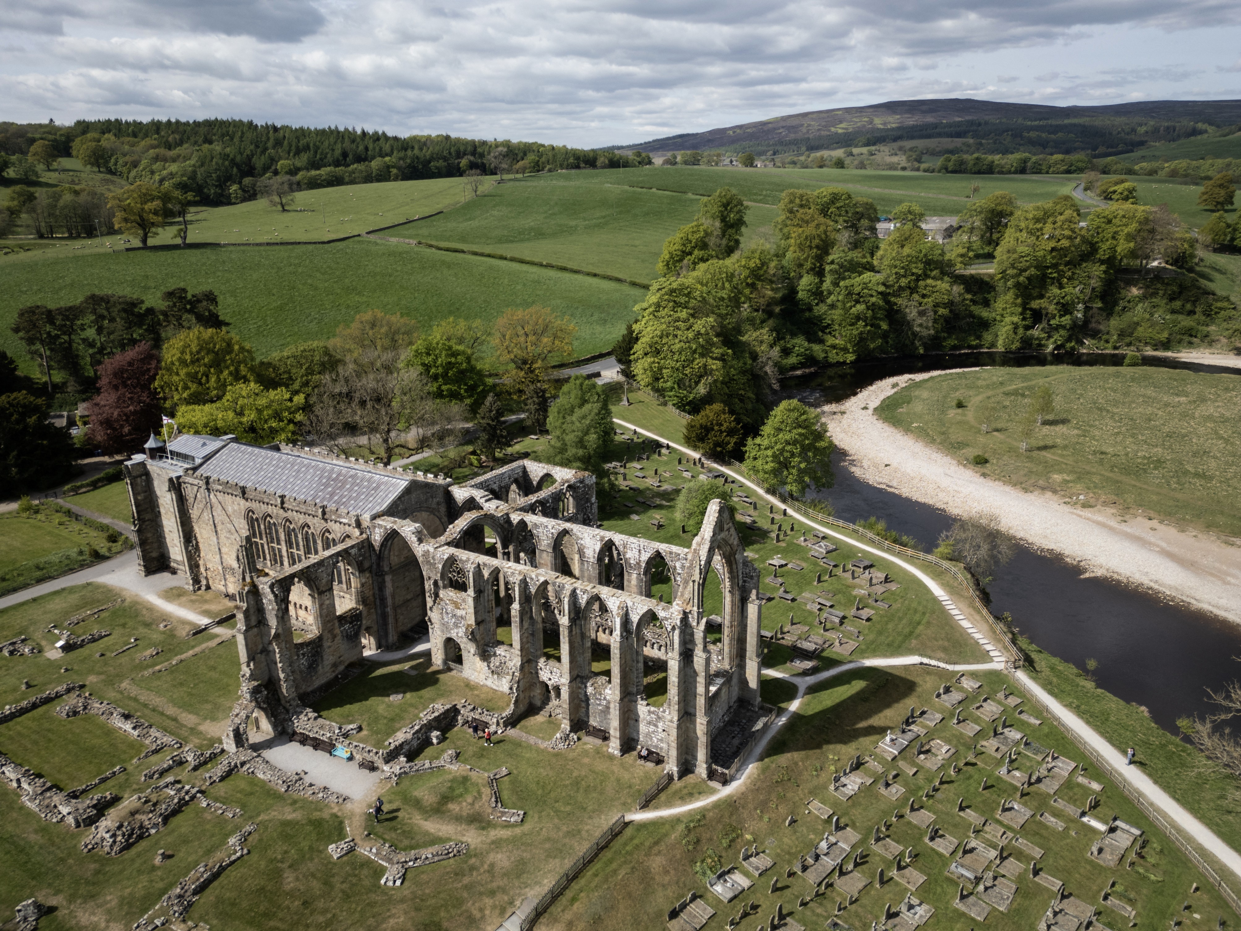 An aerial view of the ruins of a centuries-old abbey
