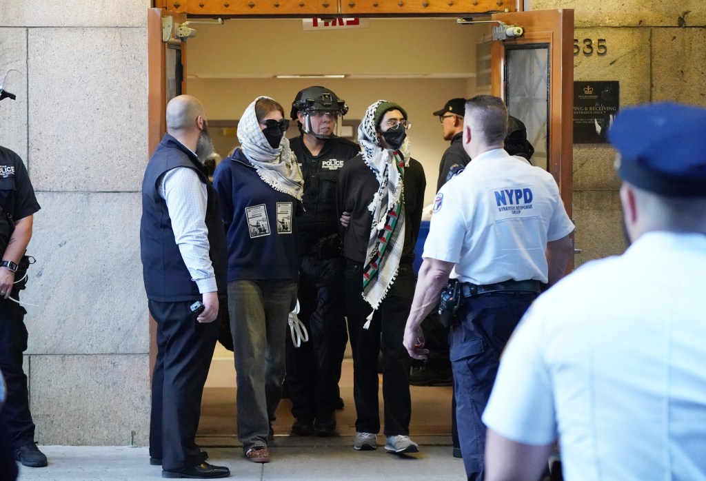 Protesters being arrested after storming and occupying the Butler Library at Columbia University in New York, NY on May 7, 2025. 