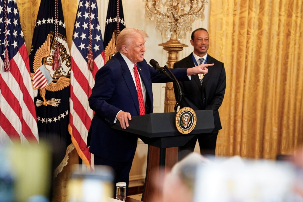 Tiger Woods and President Trump in February 2025