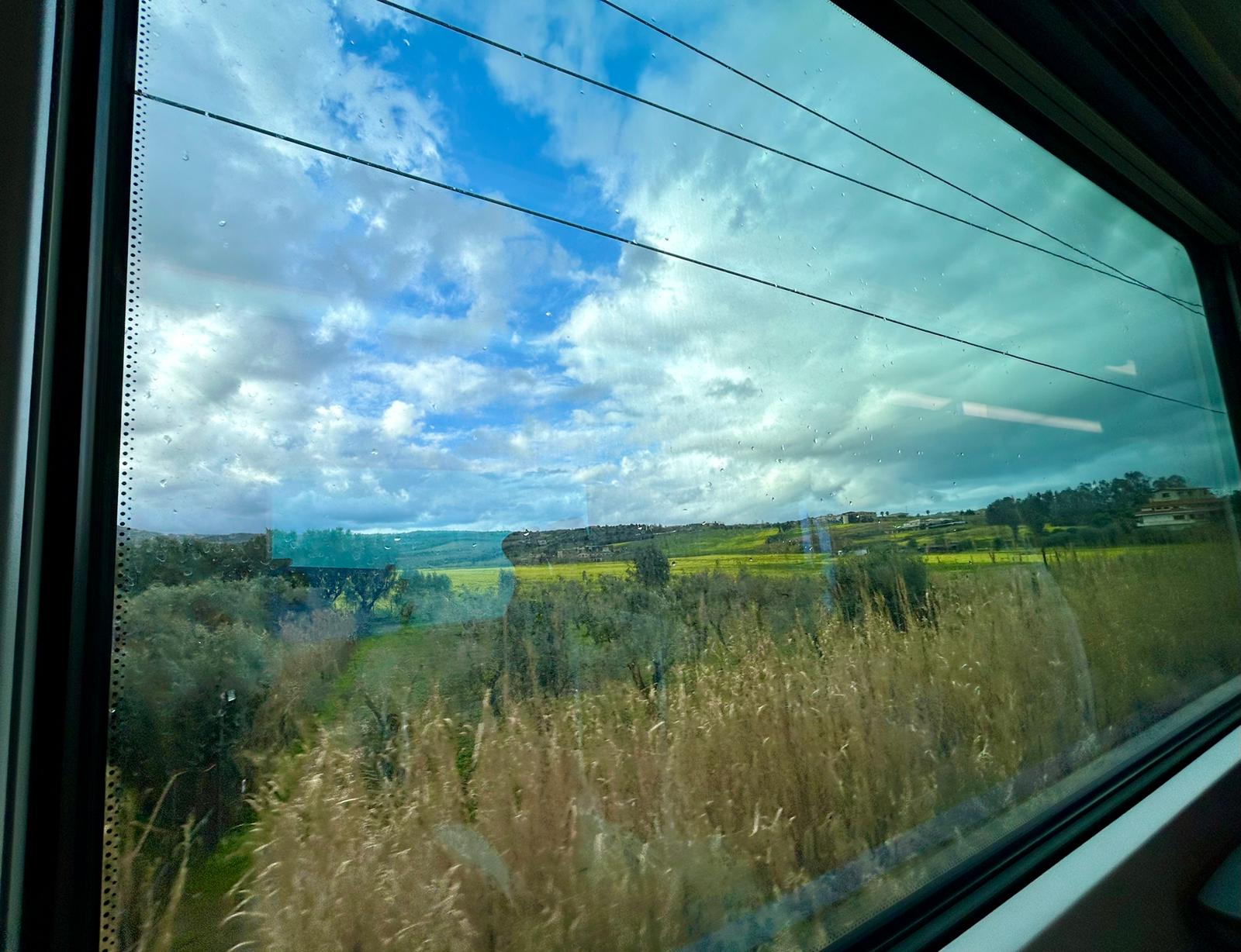 The author's view during their train ride from Rome to Florence.