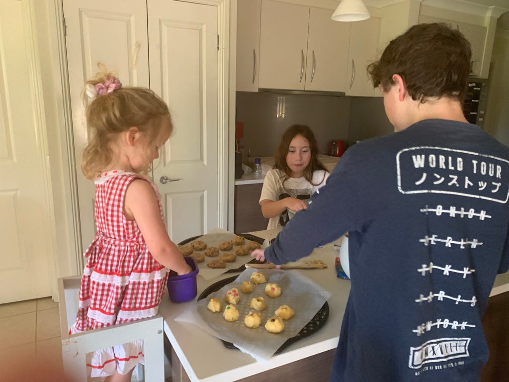 Kids making cookies in the kitchen