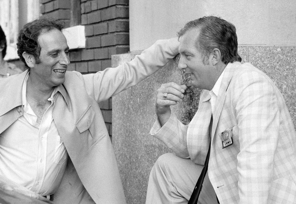 New York police detectives Joseph Borelli, left, and Richard Paul, right, at the Brooklyn court house in New York, Thursday, August 11, 1977.