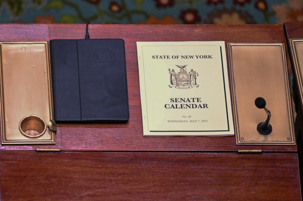 A New York State Senator's desk is seen as lawmakers debate budget bills during a legislative session in the Senate Chamber at the state Capitol Wednesday, May 7, 2025, in Albany, N.Y.