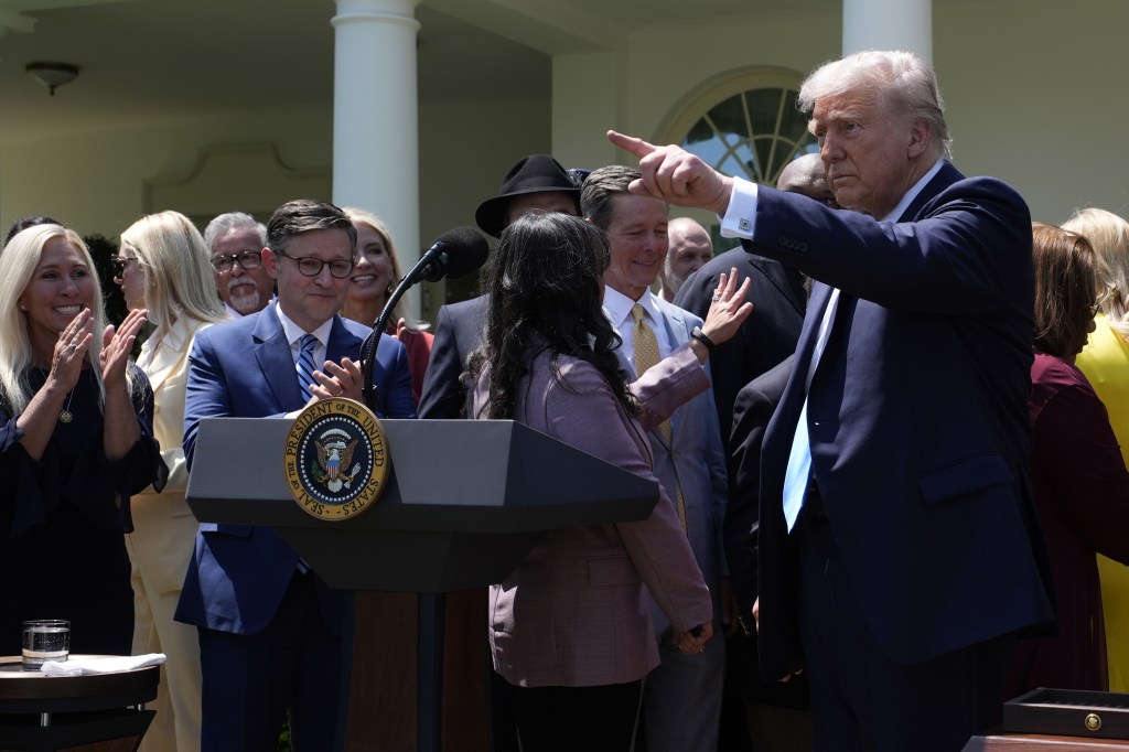 Rep. Greene stood near President Trump as he signed an order regarding religious freedom on May 1.