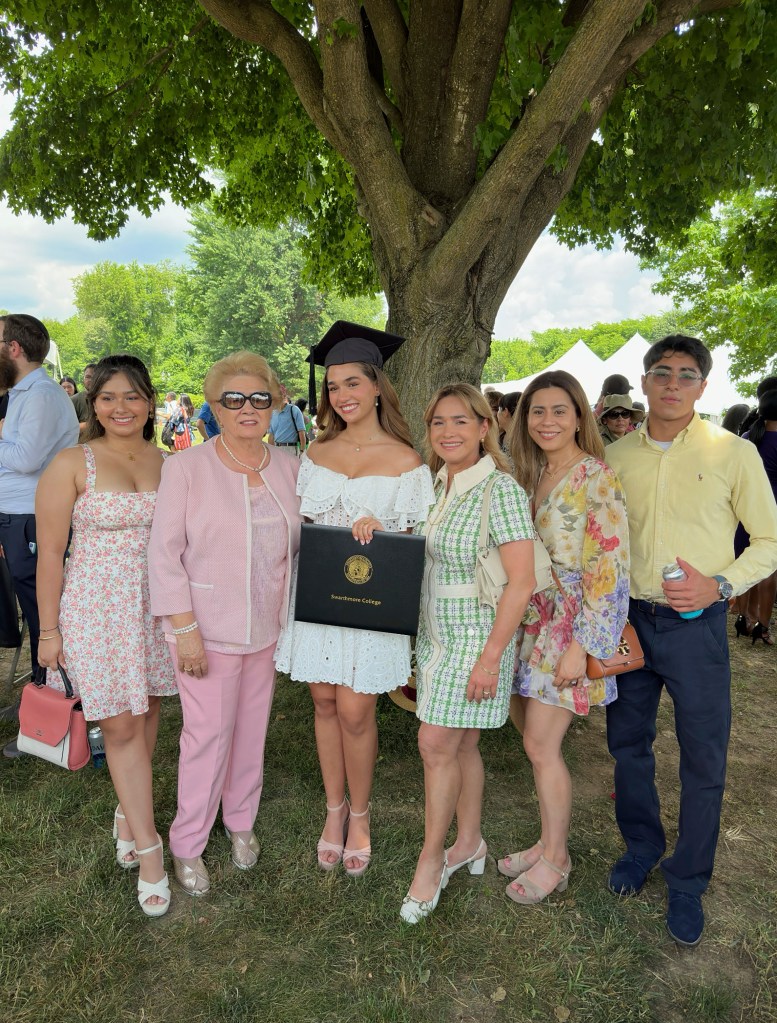 Alexia Couyutas Duarte, one of the victims of the crash, poses with her family after her graduation from Swarthmore College.