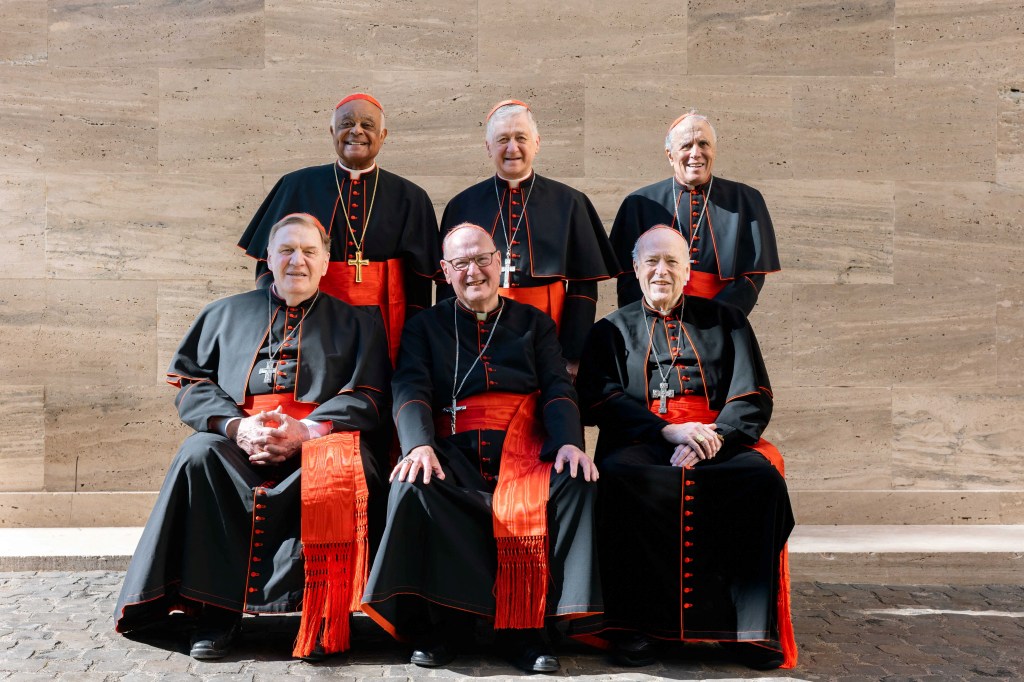 U.S Cardinals Wilton Gregory, Blase Cupich, Daniel DiNardo, Joseph Tobin, Timothy Dolan and Robert McElroy pose for a photo before leaving the Pontifical North American College ahead of the conclave, in Rome, Italy May 6, 2025.