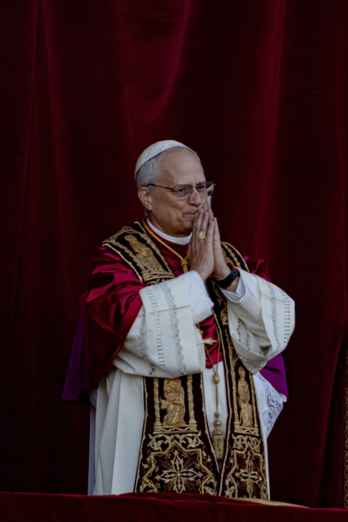 Newly elected Pope Leo XIV, formerly Cardinal Robert Francis Prevost, appears on the central loggia of St. Peter's Basilica at the Vatican shortly after his election as the 267th pontiff of the Roman Catholic Church, Thursday, May 8, 2025.
