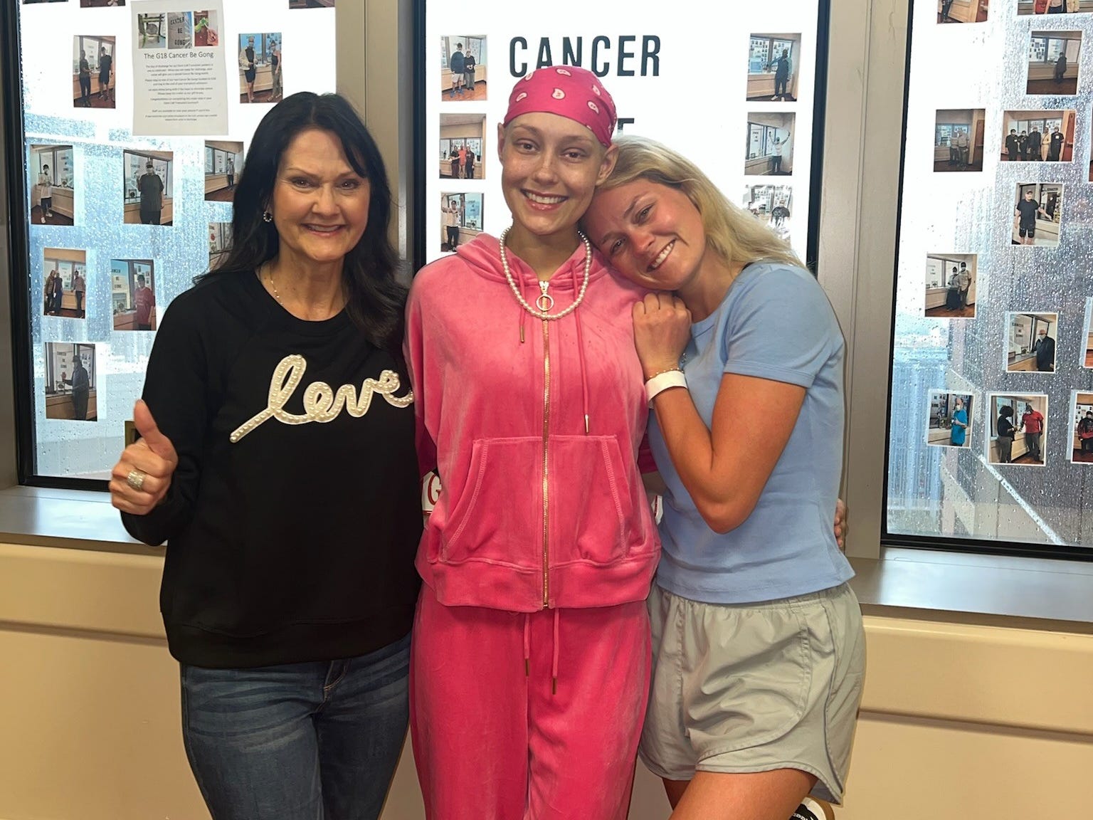 Breeze Hunter at the hospital with her mom and sister after her stem cell transplant.