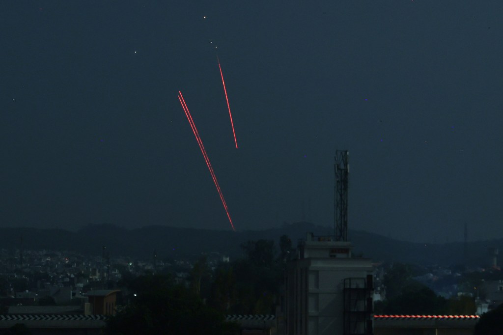 Trails from an Indian air defence system are seen above Jammu during a Pakistani strike on May 9, 2025.