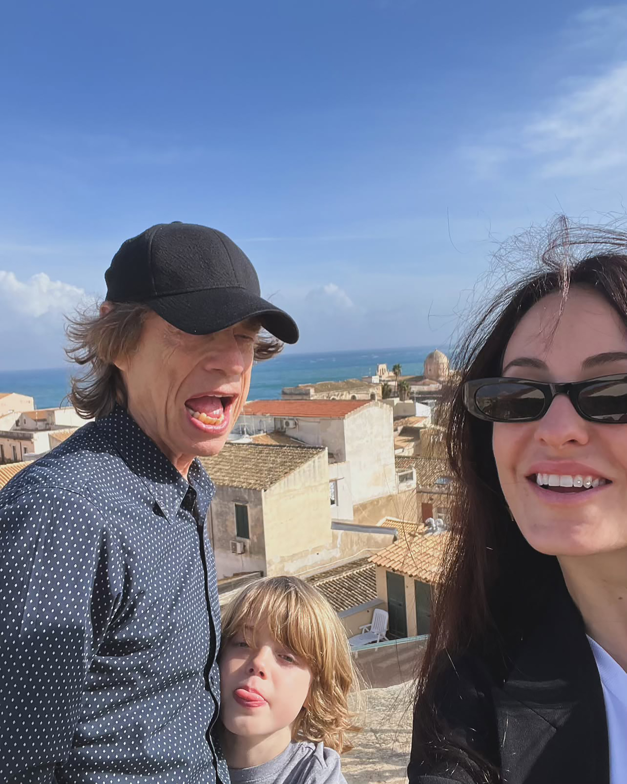 Mick Jagger and Melanie Hamrick and their son.