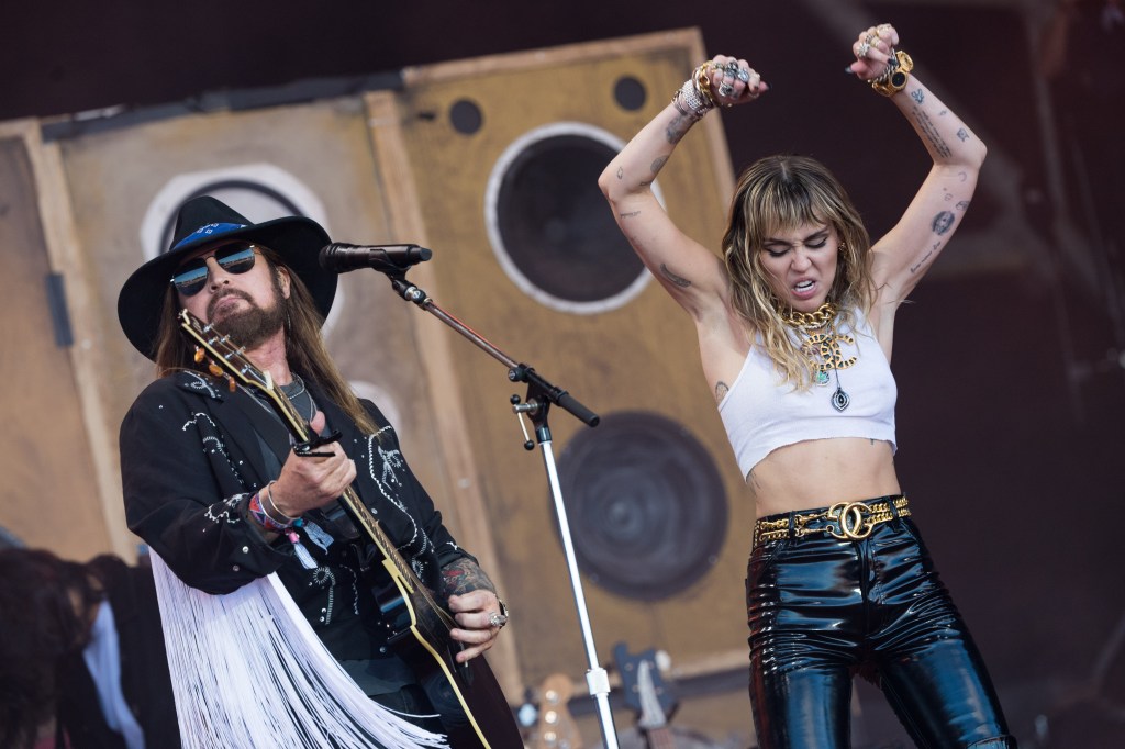 Billy Ray Cyrus and Miley Cyrus perform on the Pyramid stage on day five of Glastonbury Festival at Worthy Farm, Pilton on June 30, 2019 in Glastonbury, England
