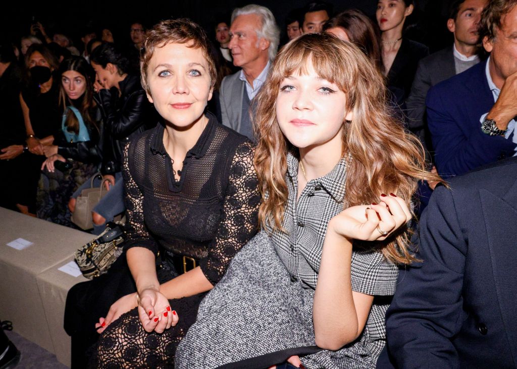 Maggie Gyllenhaal and her daughter Ramona Sarsgaard at the Dior SS23 RTW event in Jardin des Tuileries, Paris.