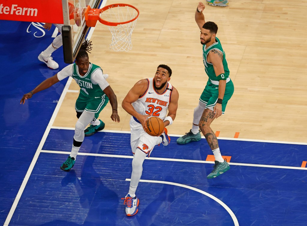 Karl-Anthony Towns drives to the basket Saturday in the first quarter of Game 3 of the Knicks-Celtics series. 