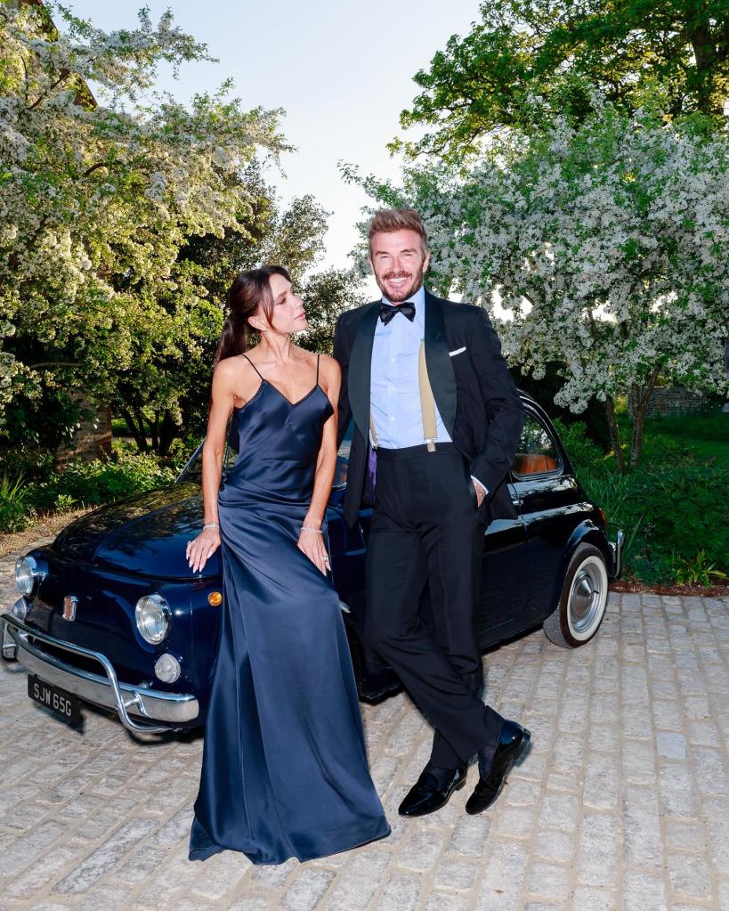 David and Victoria Beckham pose for a photo.