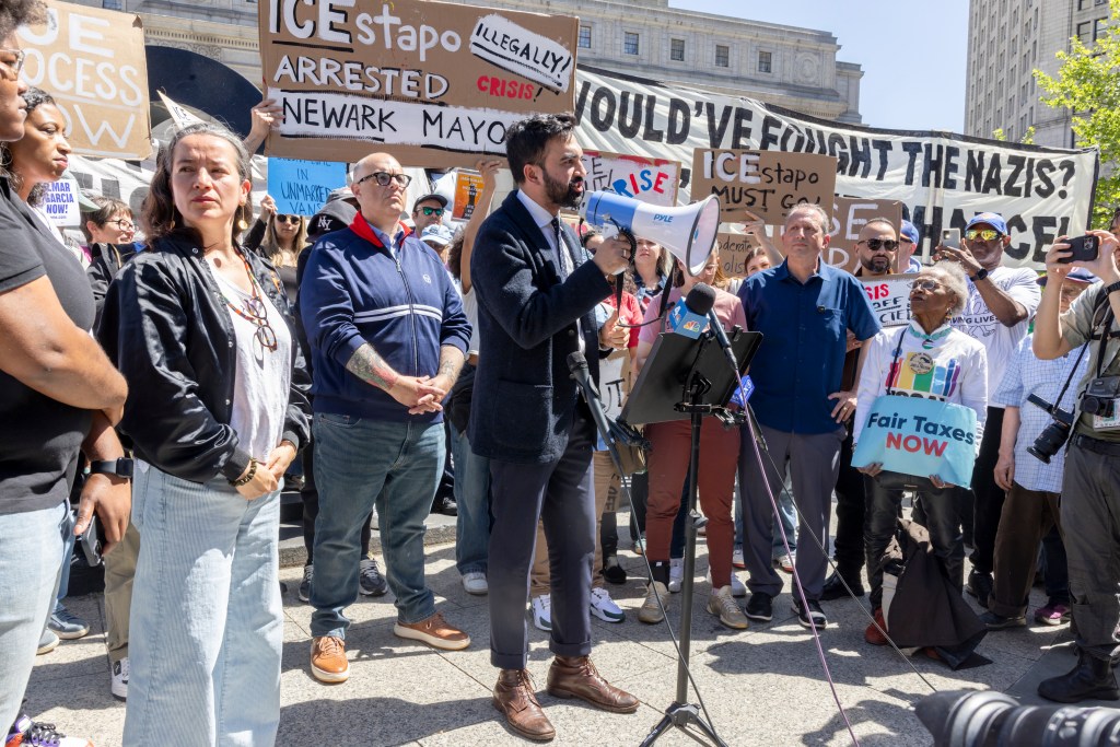 Zohran Mamdani speaking to the crowd at a protest against Newark Mayor Ras Baraka's arrest in Foley Square on May 10, 2025
