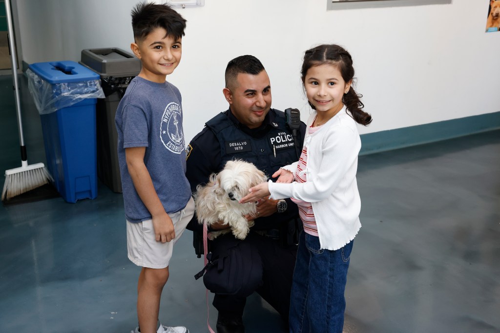 DeSalvo and his kids seen holding Hudson.