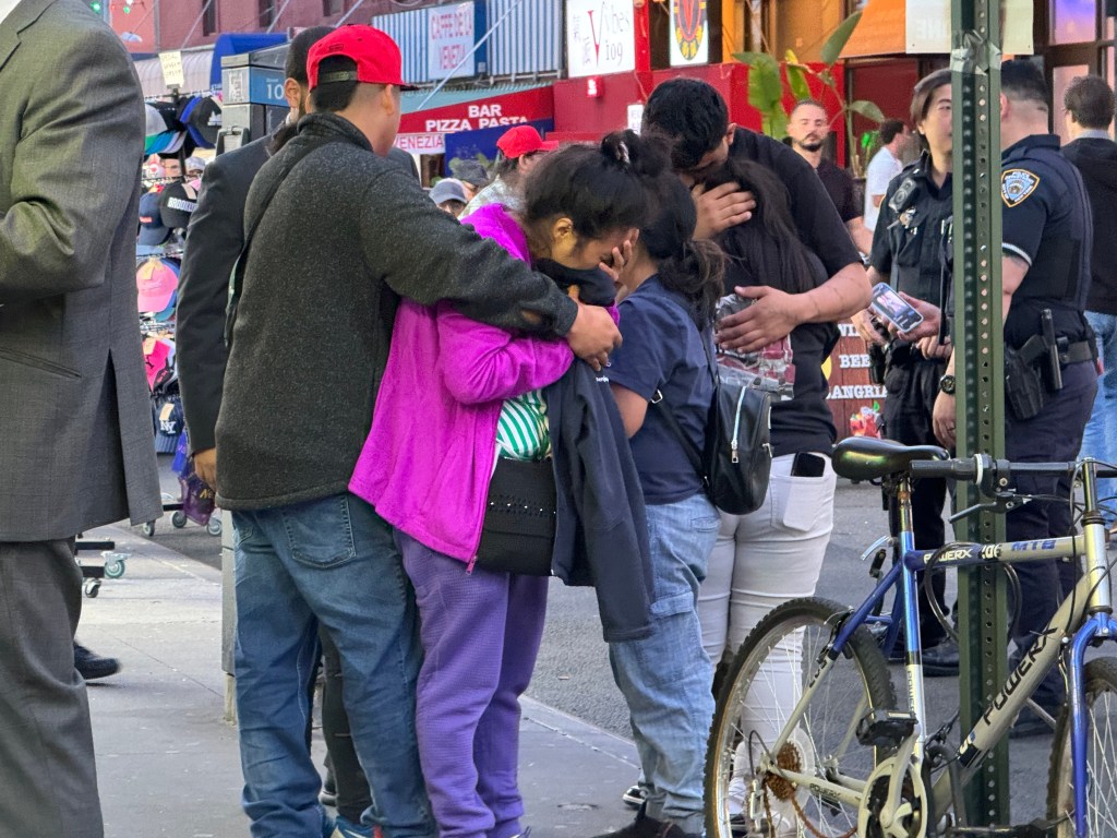 While most seemed largely unaffected by the disturbing site, one woman was visibly distraught. 