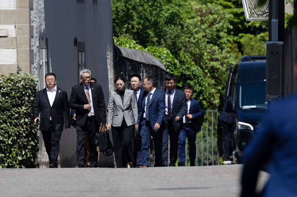 Members of the Chinese delegation leave a residence where trade talks between Chinese and U.S. delegations take place in Geneva, Switzerland, May 10, 2025.
