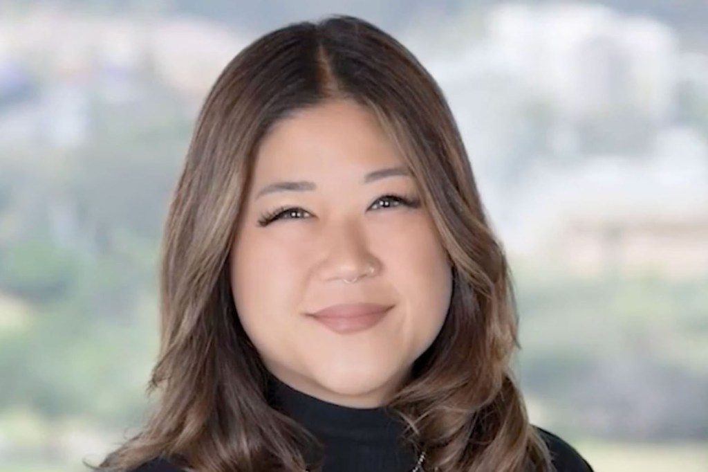 A professional headshot of Ma.