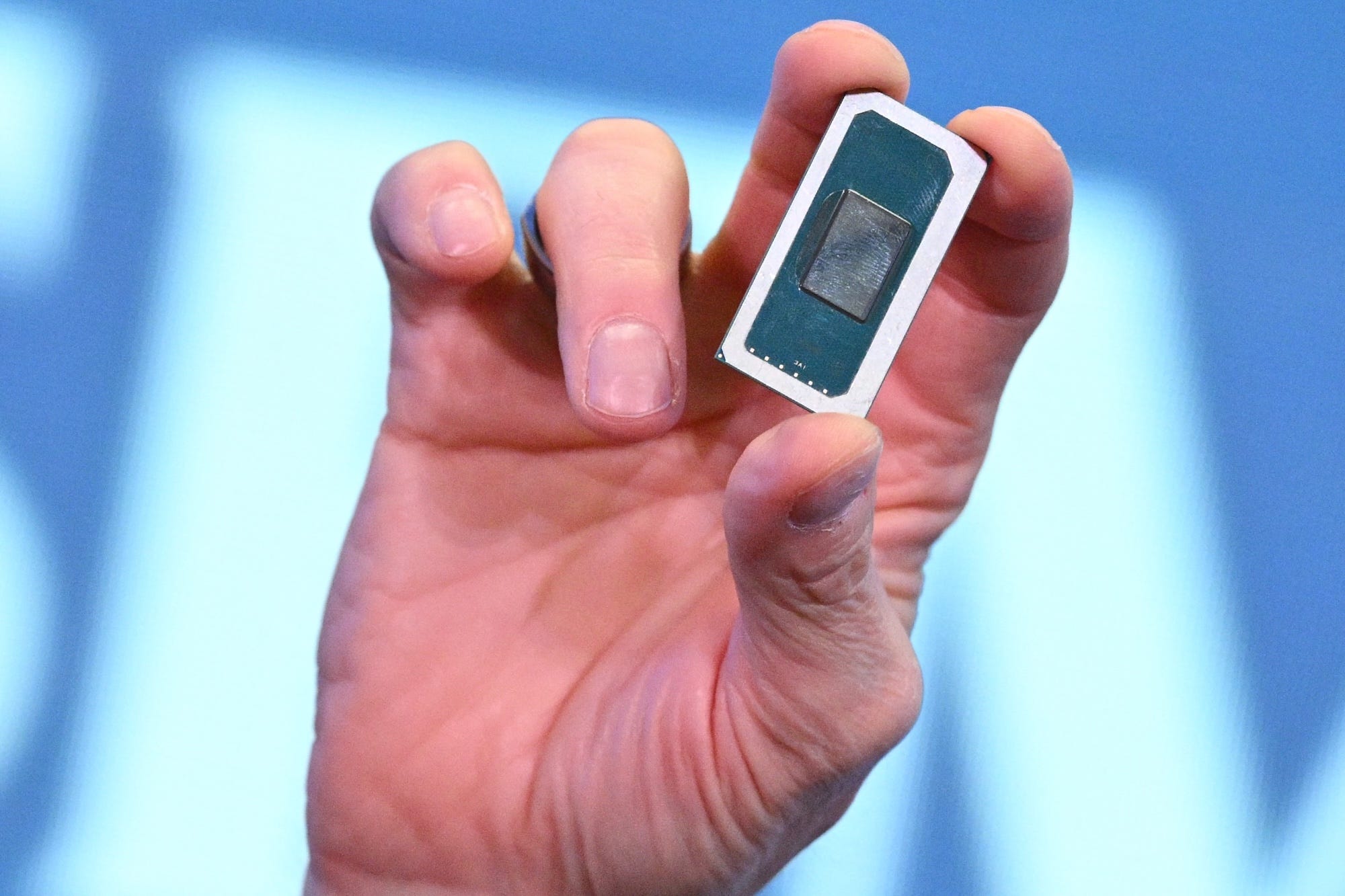 A hand holds up Intel's