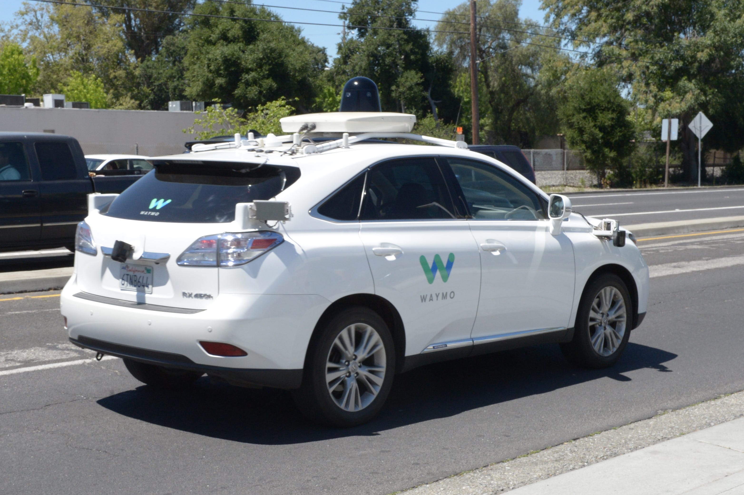 A white Lexus SUV