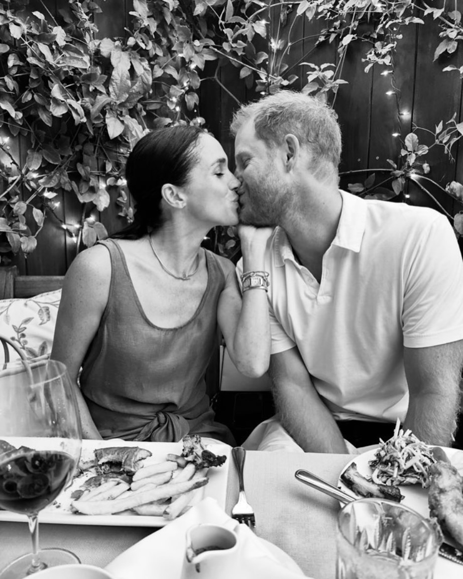 Prince Harry and Meghan Markle kissing