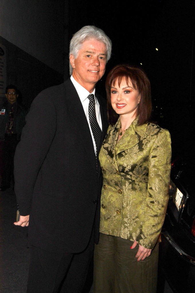 Naomi Judd and her husband Larry Strickland pose together.