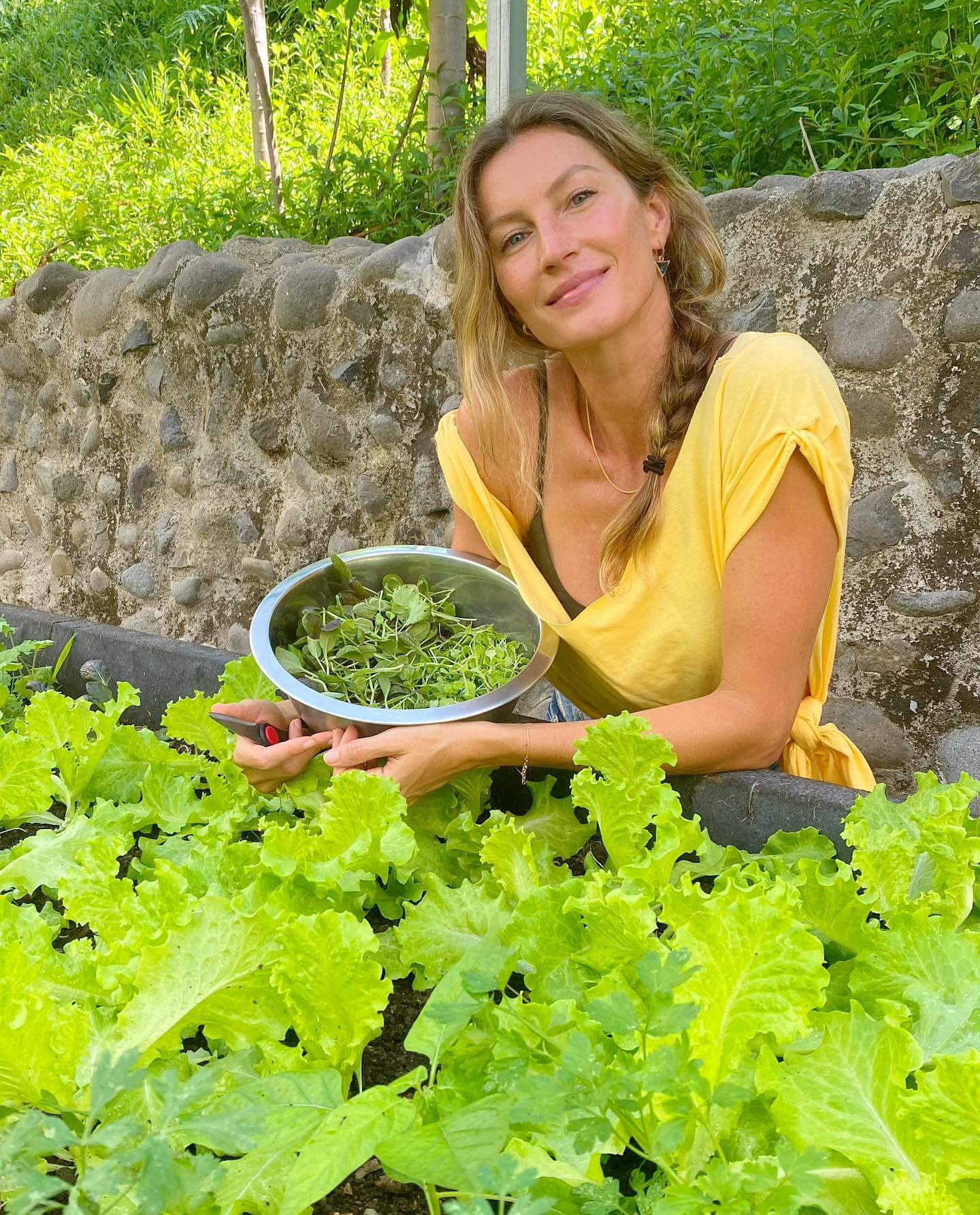Gisele Bündchen in a garden