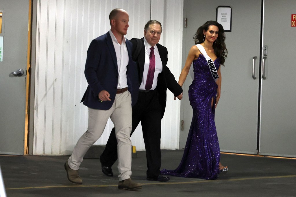 Jordon Hudson and Bill Belichick were photographed leaving the Holiday Inn in Portland, Maine, on Saturday.