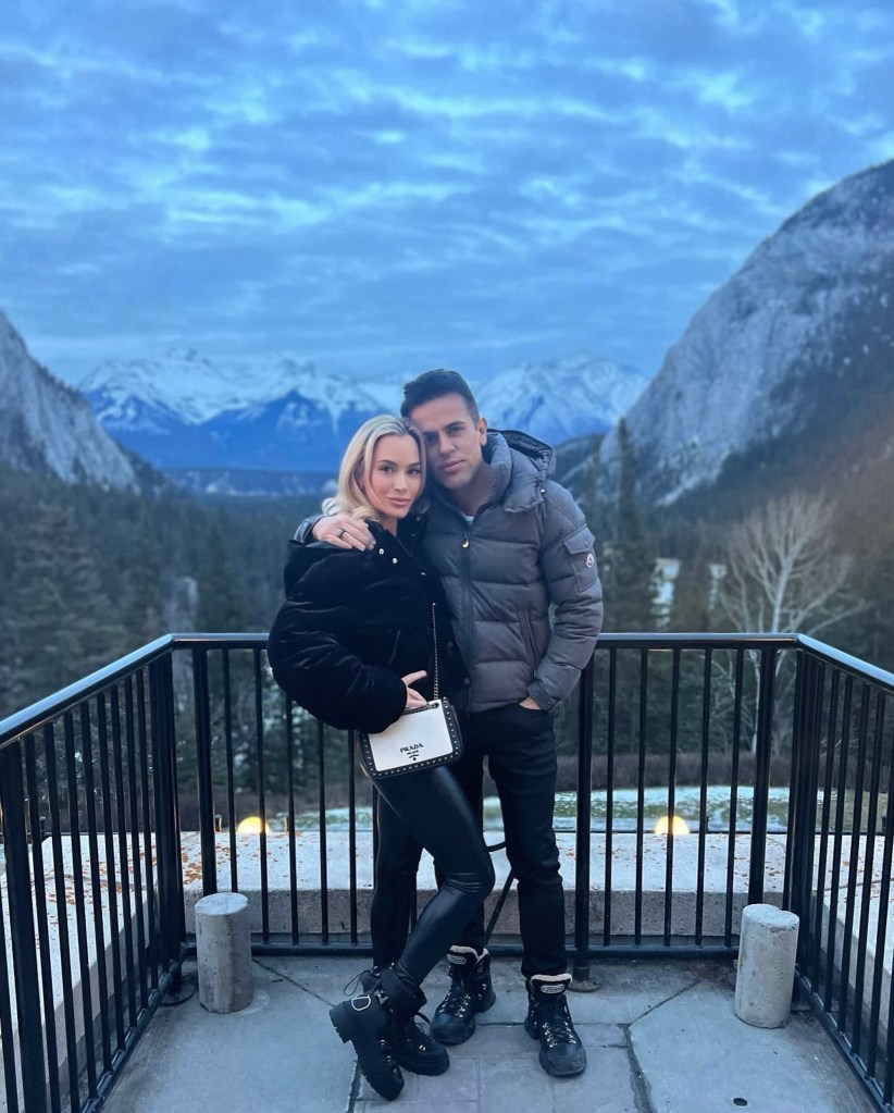 Teddi Mellencamp and Edwin Arroyave pose together.