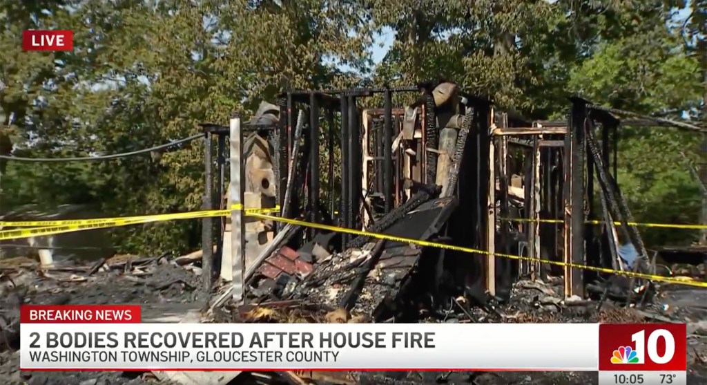 The smoldering remains of the fire that engulfed the home.