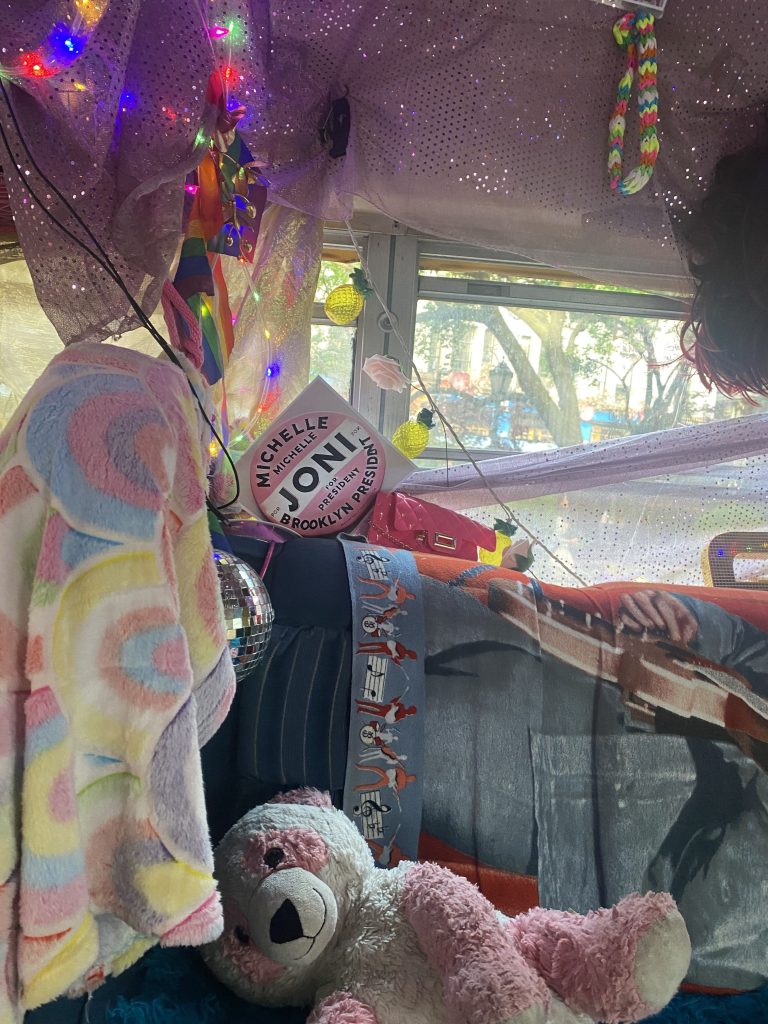 The inside of Glinda the Good Bus is colorfully decorated.